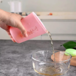 Customized Recyclable Silicone Measuring Cup with Lid Factory3